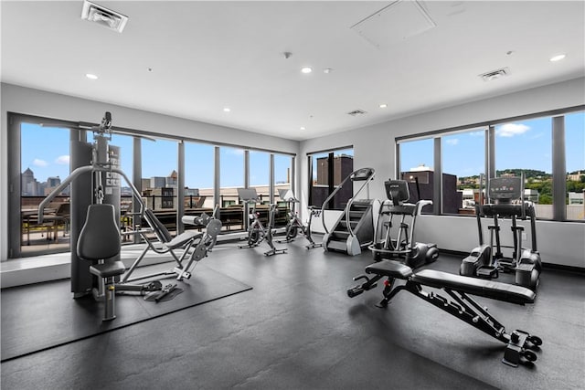 exercise room with healthy amount of natural light and recessed lighting