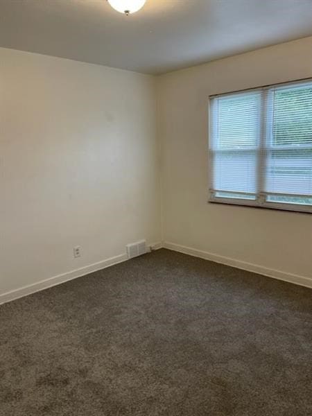 view of carpeted spare room