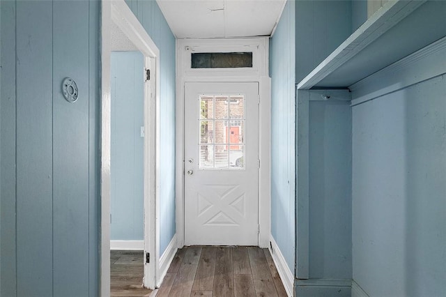 entryway with hardwood / wood-style flooring