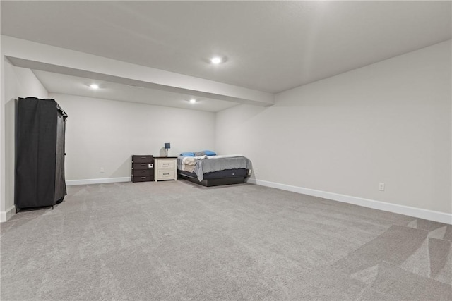 bedroom with light carpet