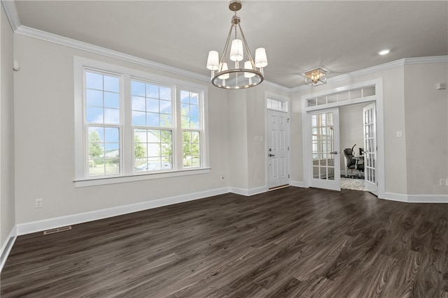 unfurnished living room with a notable chandelier, dark wood-type flooring, and crown molding