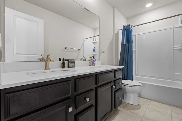 full bathroom featuring shower / bathtub combination with curtain, double vanity, tile patterned floors, and toilet