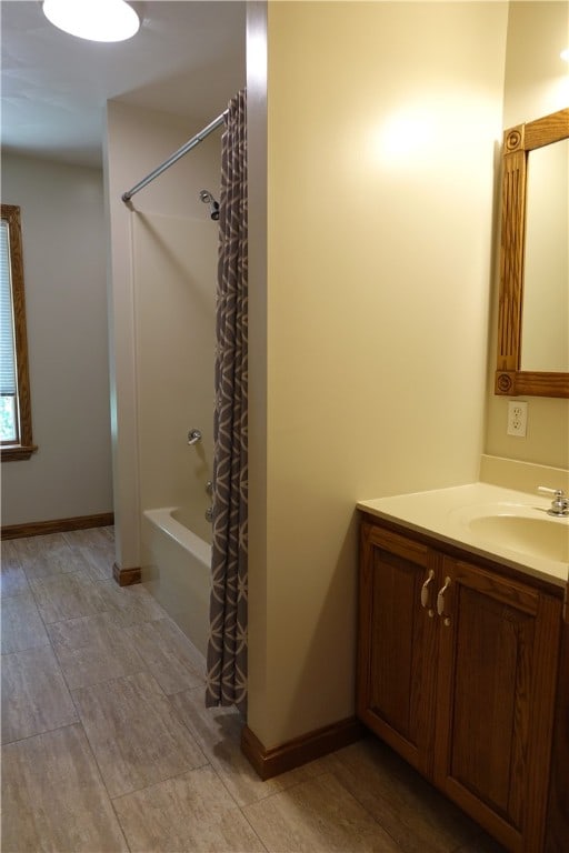 bathroom with vanity and shower / bathtub combination with curtain