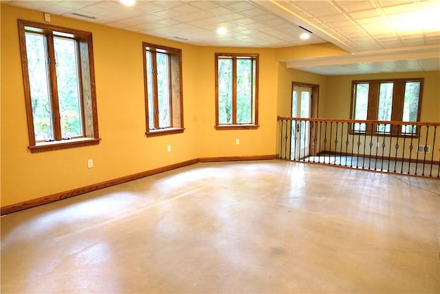 spare room featuring concrete floors