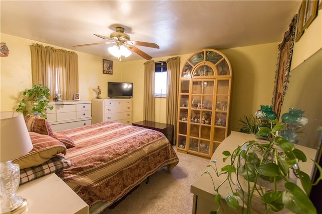 bedroom with carpet flooring and a ceiling fan