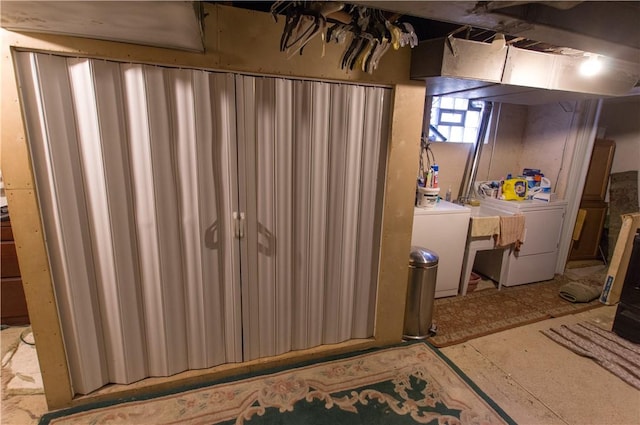 basement with washer and clothes dryer