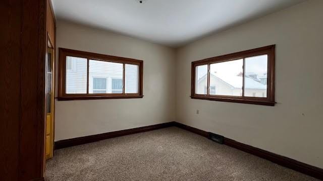 view of carpeted spare room