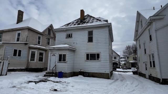 view of snow covered property