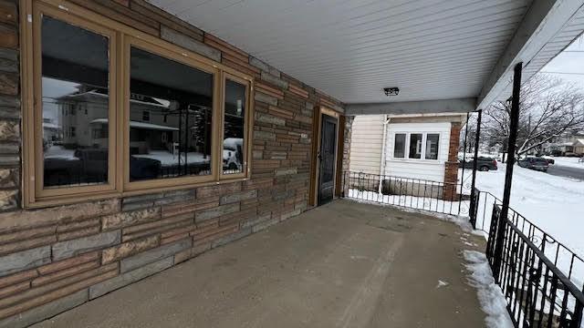 view of snow covered patio