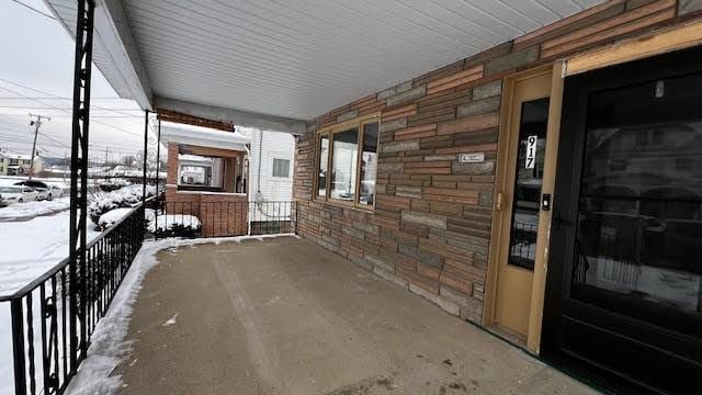 view of snow covered patio