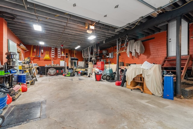 garage with a workshop area