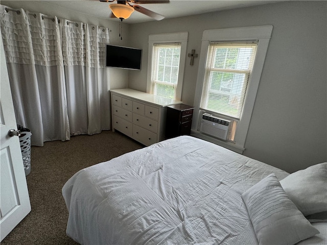 carpeted bedroom with ceiling fan and cooling unit