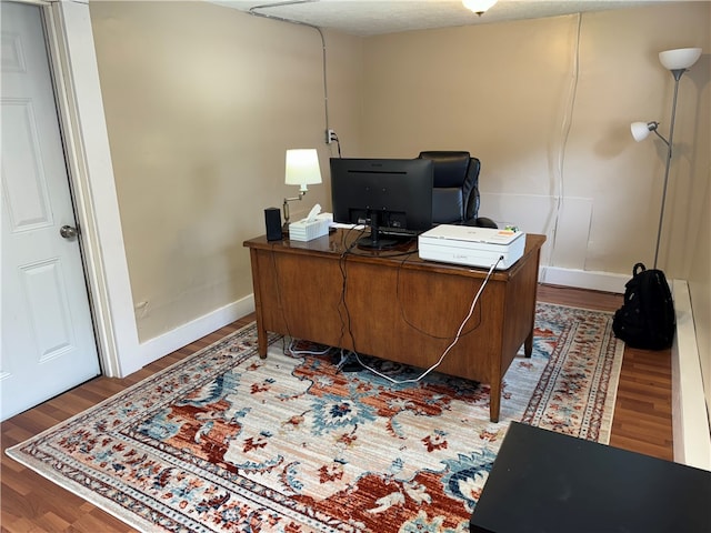 office featuring hardwood / wood-style floors