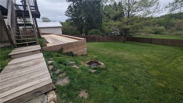 view of yard featuring a deck