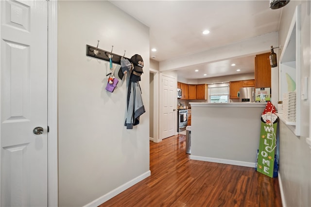 hallway featuring hardwood / wood-style floors