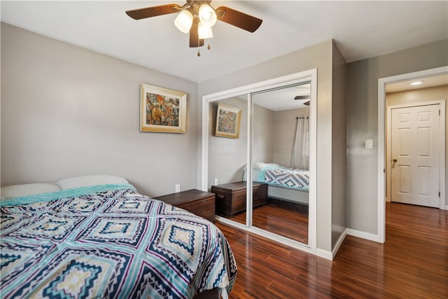 bedroom featuring ceiling fan, hardwood / wood-style floors, and a closet