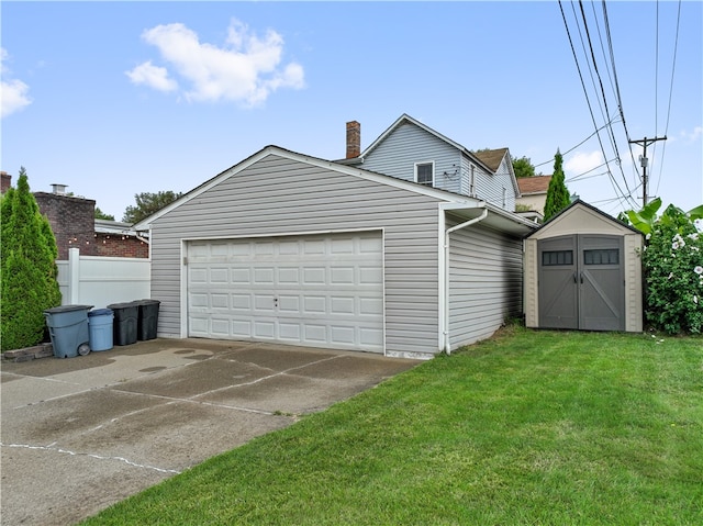 view of side of home featuring a shed, a yard, and a garage