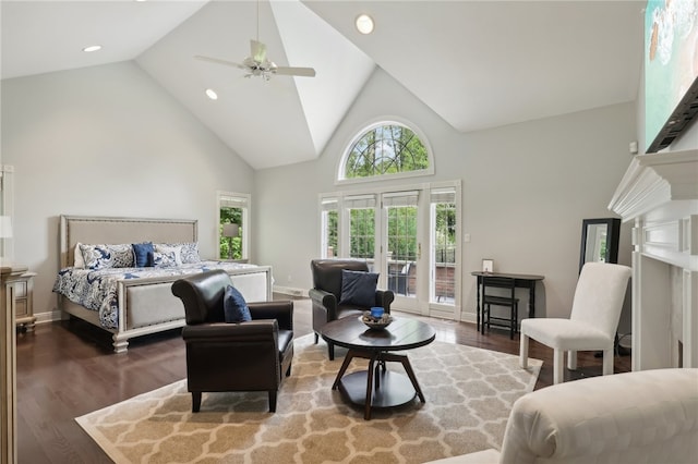 bedroom with dark hardwood / wood-style floors, ceiling fan, french doors, access to exterior, and high vaulted ceiling