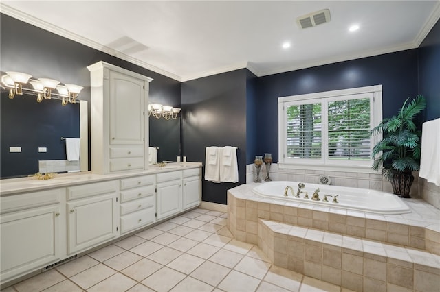 bathroom featuring tiled tub, double sink vanity, ornamental molding, and tile patterned flooring