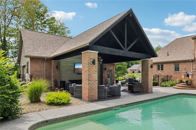 view of swimming pool with a patio and outdoor lounge area