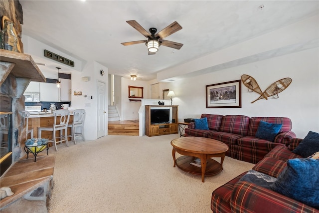 living room featuring ceiling fan