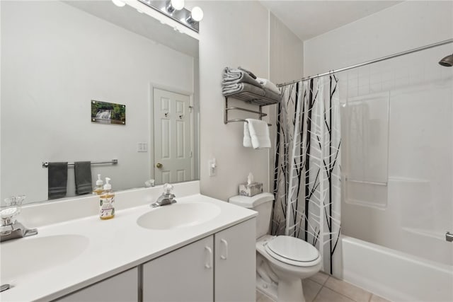 full bathroom featuring toilet, tile patterned flooring, shower / bath combo, and vanity