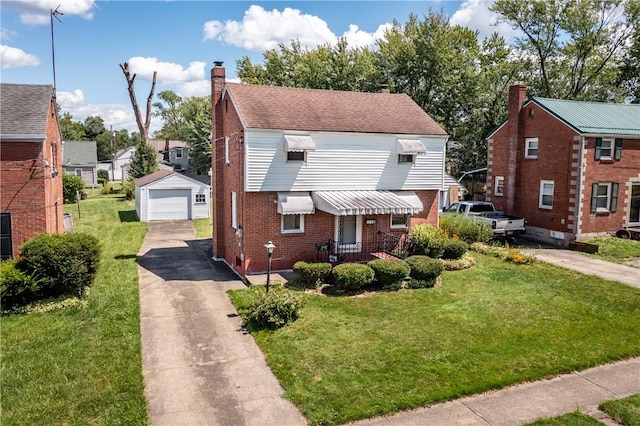 bungalow-style house featuring a garage, an outbuilding, a wall unit AC, and a front lawn