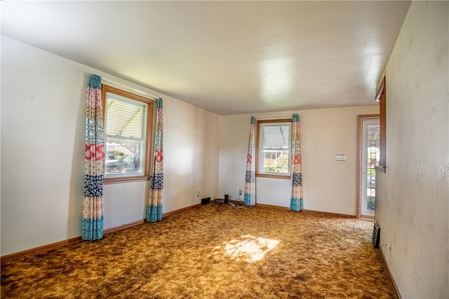 view of carpeted spare room