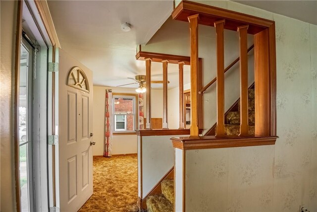 interior space featuring light colored carpet