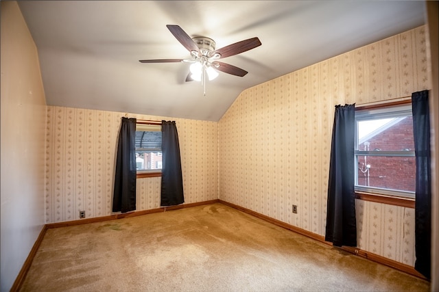 bonus room featuring vaulted ceiling, ceiling fan, and carpet floors