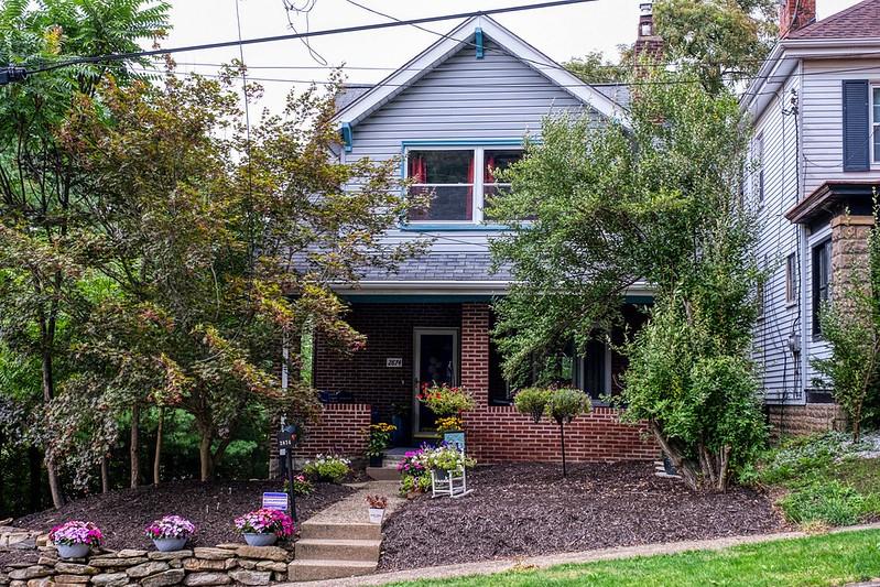 view of front of house featuring brick siding