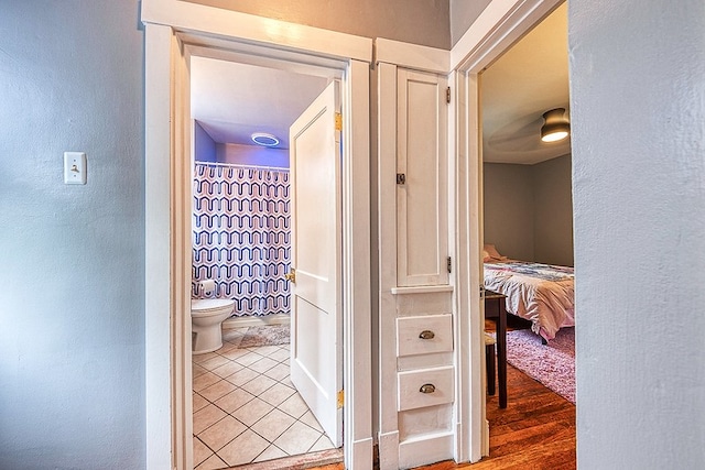 corridor featuring tile patterned floors