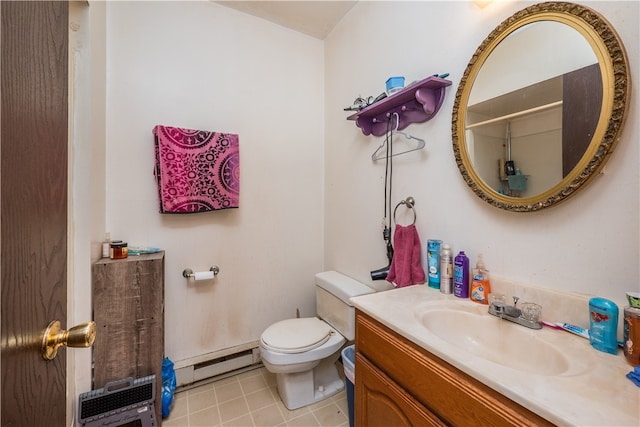 bathroom with a baseboard radiator, toilet, tile patterned floors, and vanity