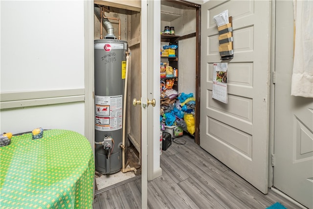 utility room with water heater