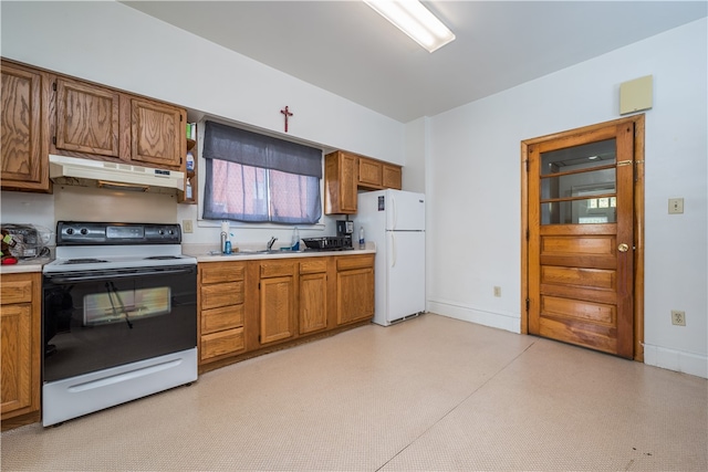 kitchen with white appliances and sink