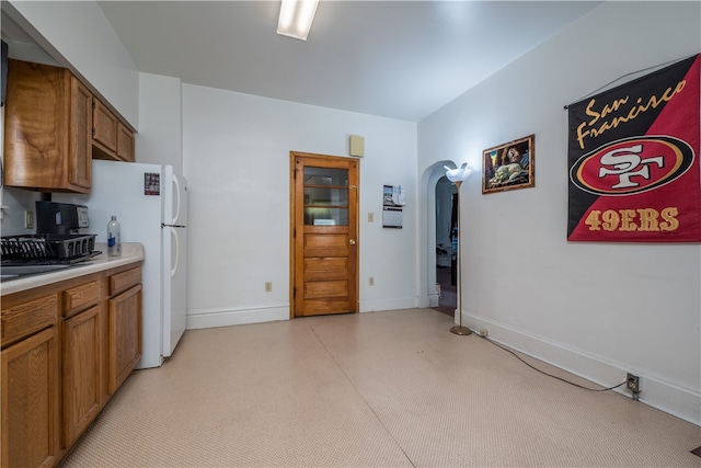 kitchen with white fridge