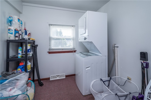 laundry area with carpet flooring and stacked washer and dryer