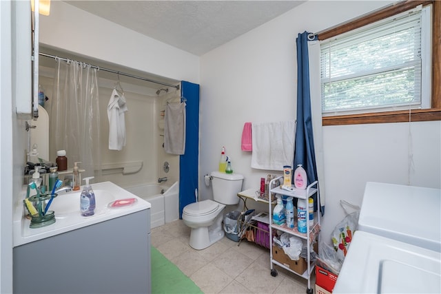 full bathroom featuring a textured ceiling, toilet, tile patterned flooring, shower / bath combination with curtain, and vanity