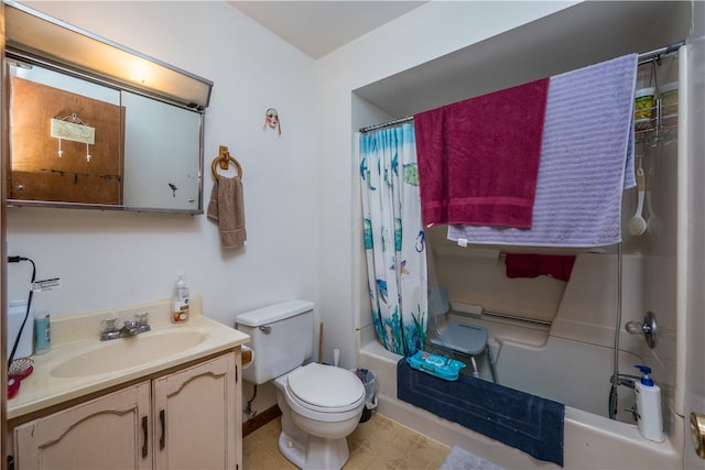 full bathroom featuring shower / tub combo, vanity, tile patterned flooring, and toilet