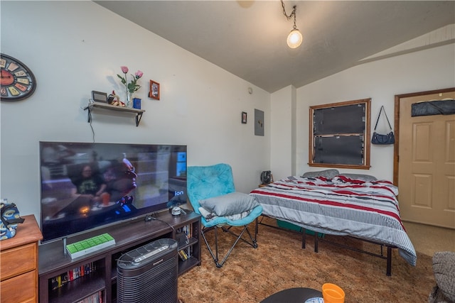 carpeted bedroom with lofted ceiling