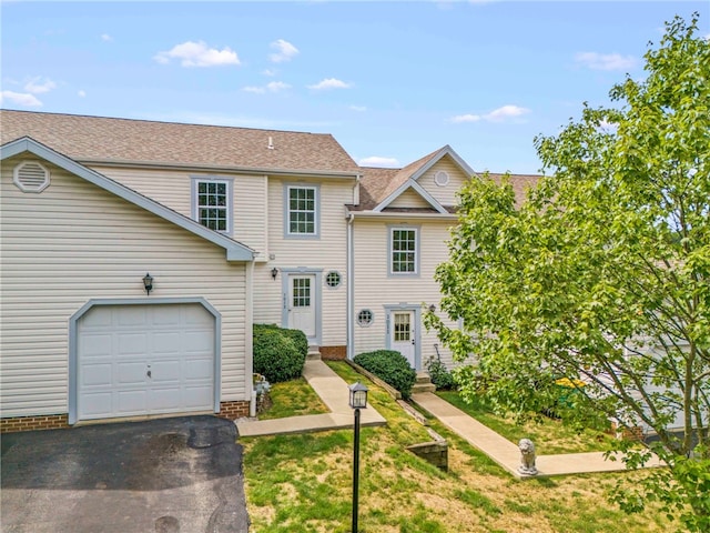 view of front property with a garage