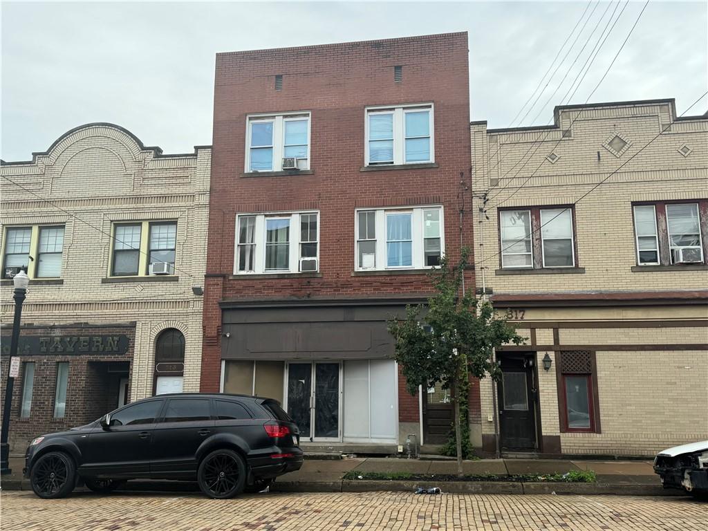 815 Broadway Ave, Mckees Rocks, PA 15136 - view of front of house featuring brick siding