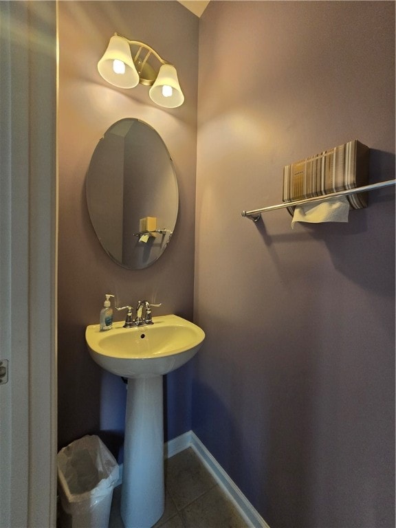 bathroom with tile patterned flooring