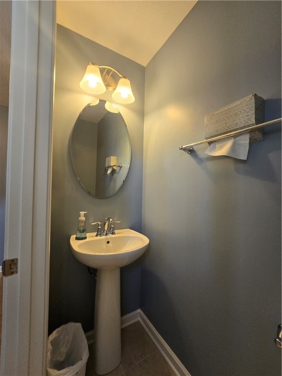 bathroom with tile patterned floors