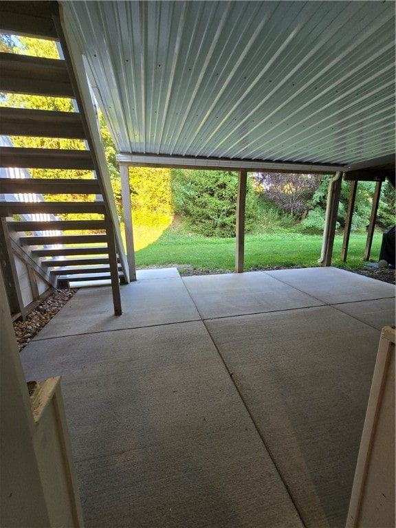 garage featuring a yard