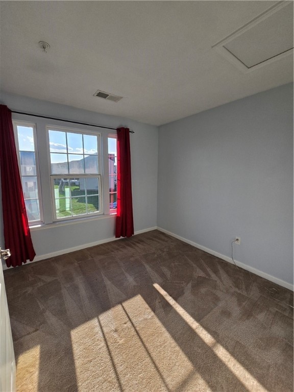 empty room featuring carpet