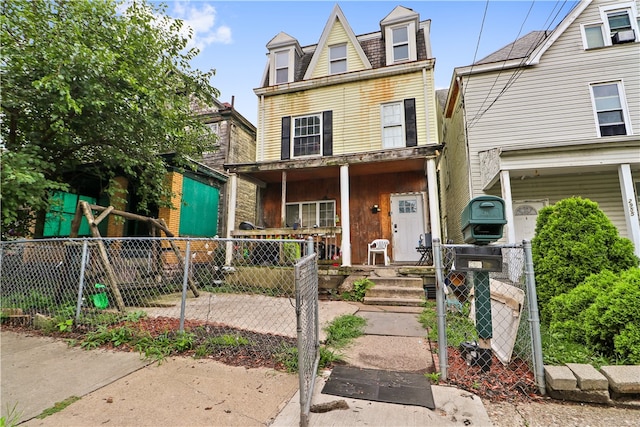 view of front of property featuring covered porch