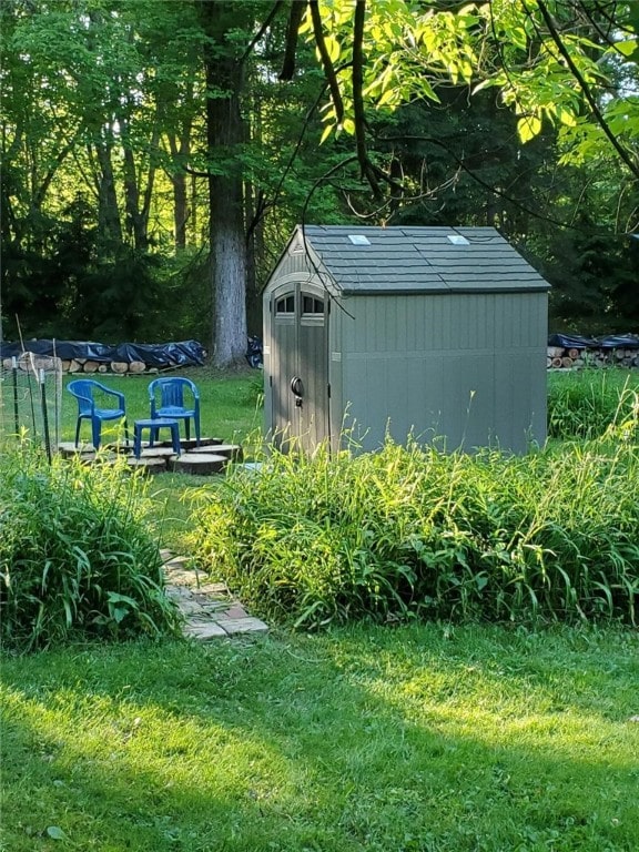 view of outdoor structure with a lawn