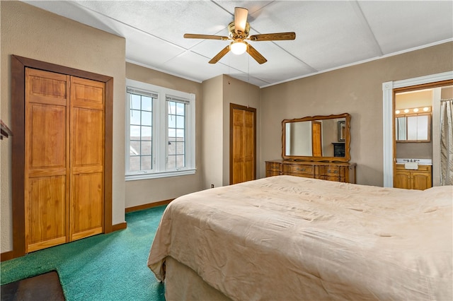 bedroom featuring ensuite bath, ceiling fan, and carpet floors