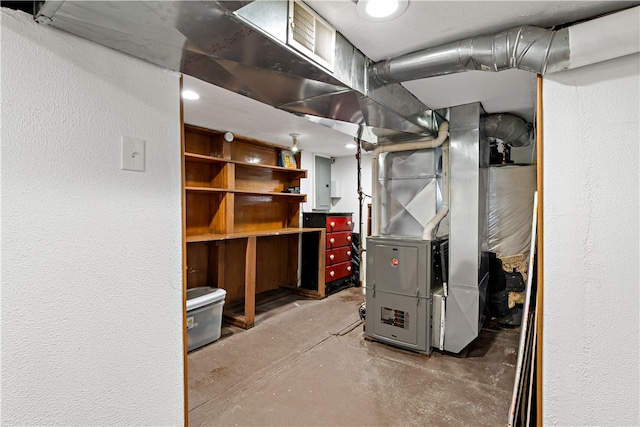 interior space with electric panel and heating unit